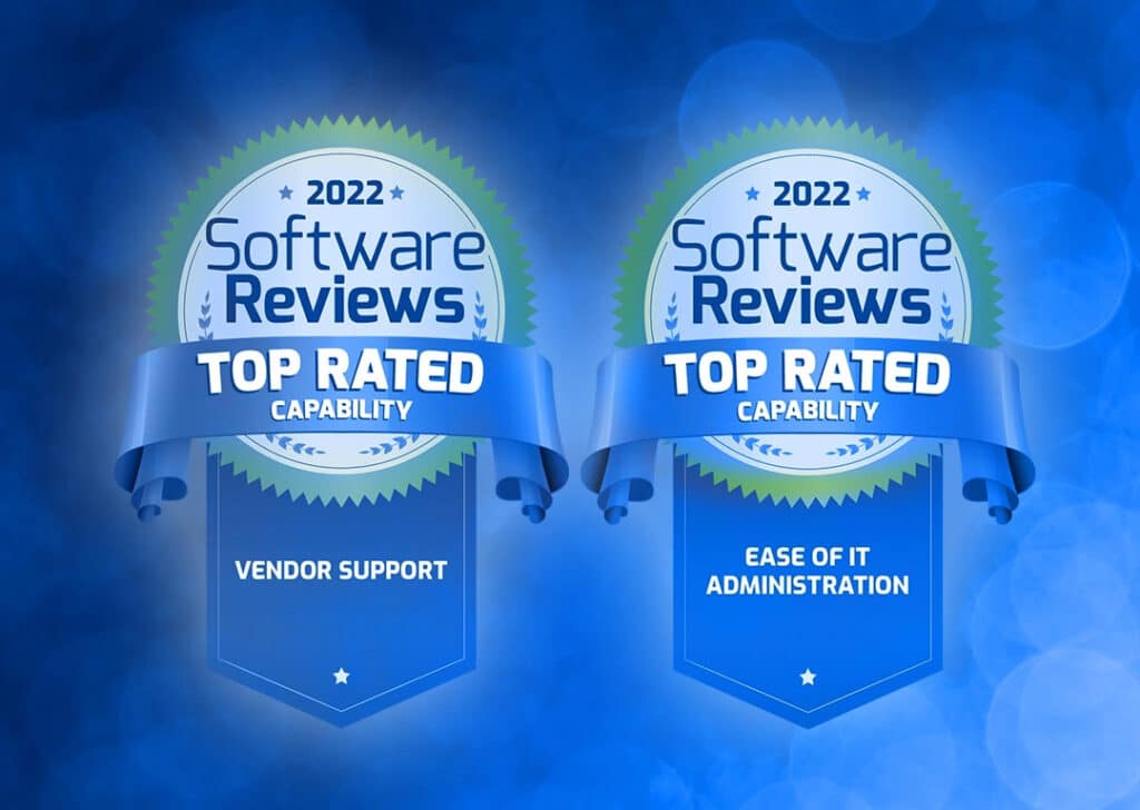 Two blue badges labeled "Software Reviews 2022 Top Rated Capability," one for "Vendor Support" and the other for "Ease of IT Administration," on a blue background.