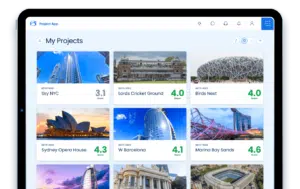 A tablet displaying a project app with images and scores for locations such as Sky NYC, Lords Cricket Ground, Birds Nest, Sydney Opera House, W Barcelona, and Marina Bay Sands.