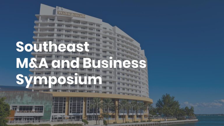 Large hotel building with "Southeast M&A and Business Symposium" text overlay against a clear blue sky.